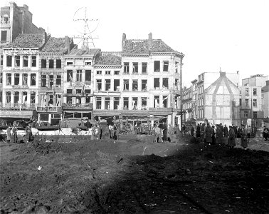 SC 329797 - View of crater and buildings following V-1 hit about 1300 hours on 5 Jan 45 at Retne Astrid, Carnot Straat and Van Schoonhoven Straat, Antwerp, Belgium. 5 January, 1945.