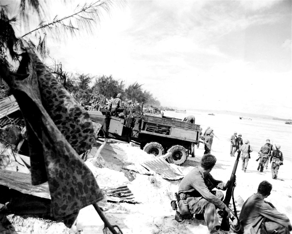 General scene of troops and supplies on beaches of Saipan, Marianas. June, 1944.