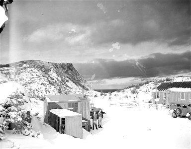 SC 171544 - U.S. Army station with ocean in background. Taken for Veterinary Corps. Outer Cove, Newfoundland. 23 January, 1943. photo