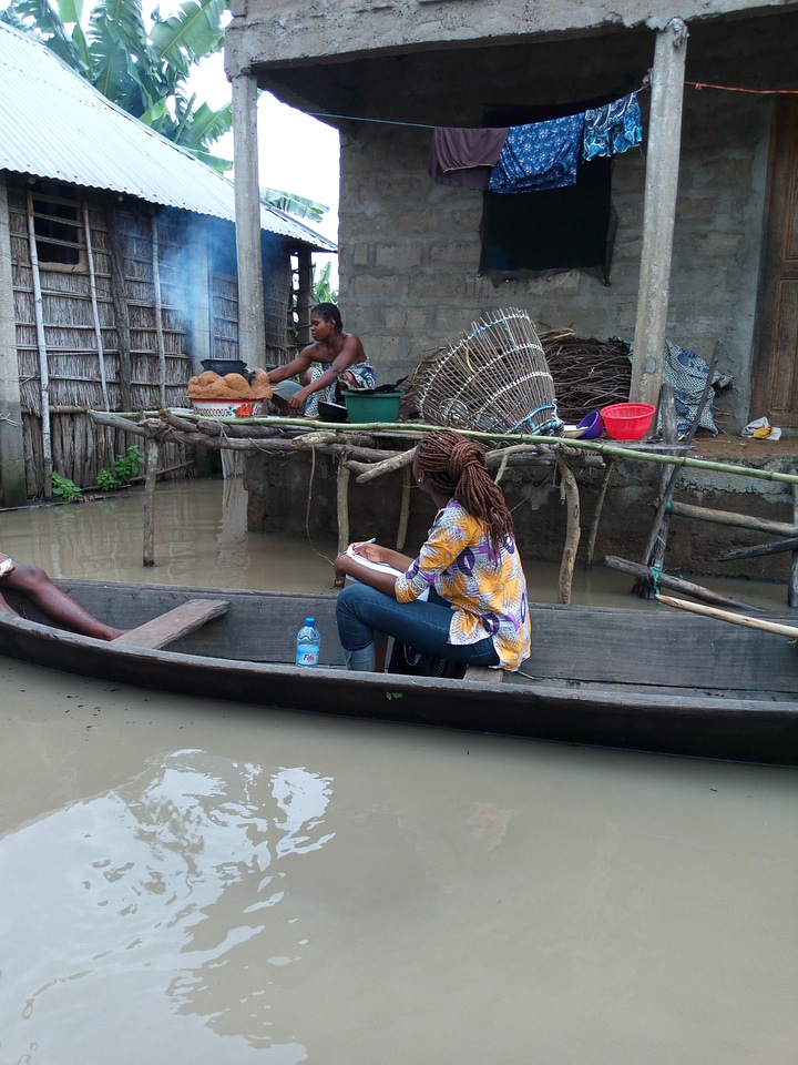 Women boat cityscape