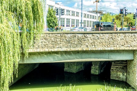 Medieval Bridge under modern bridge Maidstone. River Len