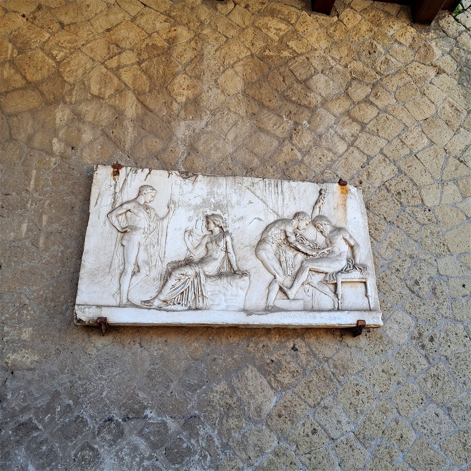 Relief of Telephus Achilles hanging out and helping put rust in Telephus Wound  Herculaneum Italy
