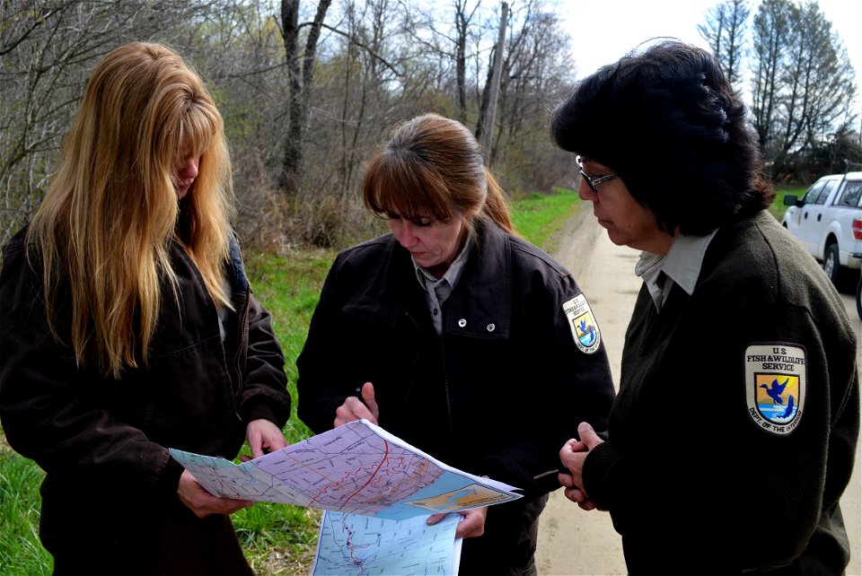 Fish Biologists Cheryl Kaye, Shawn Nowicki and Mary Henson determining where to do non-target risk assessment collections in the Conneaut Creek tributaries. photo