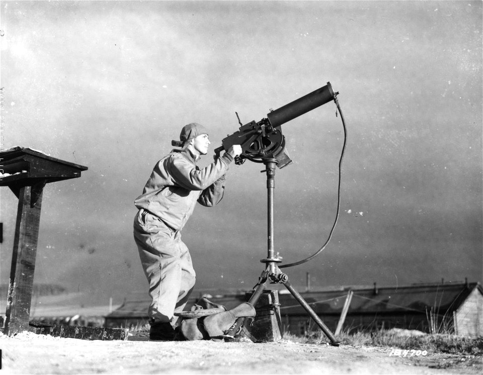 SC 184700 -  At the Spotters Look-out is Cpl. Ernest Mosman, 25, 634 E. 97th St., Cleveland, Ohio.