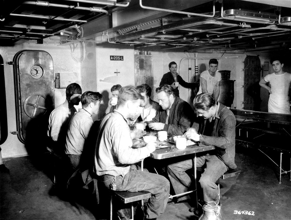 SC 364362 - Crew members in the Vulcan mess hall, crews of the Monsen and the Vulcan.