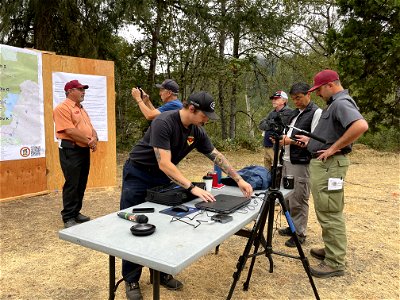 Pacific Northwest Team 3 records a Cedar Creek Fire update to share with the public. photo