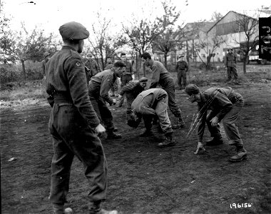 SC 196156 - American 7th Arm'd Div., and British 15th Scottish Div., fight, work and play together in Holland. photo