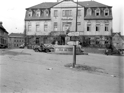 SC 335319 - American vehicles in the town of Lucka, Germany after its capture by the 6th Armored Division, 3rd U.S. Army. 13 April, 1945. photo