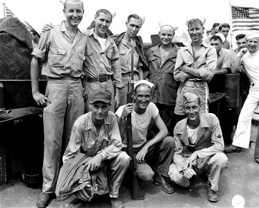SC 211451 - Group of American POWs shown on a destroyer escort as they arrived from Formosan Japanese prison camps.