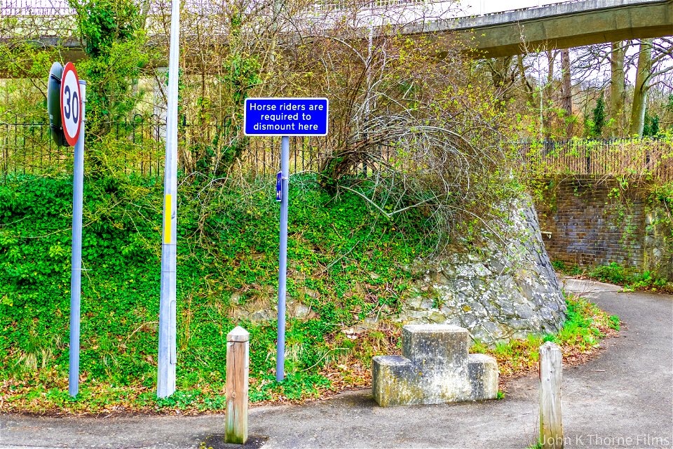Horse riders are required to dismount here.