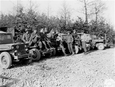 SC 334849 - Generals' drivers, sitting on jeeps waiting for generals. 22 February, 1945. photo