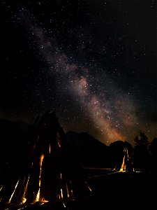 Galactic Core rises over bark houses at the San Joaquin River Gorge