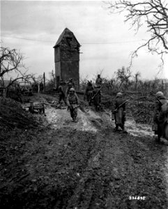 SC 336895 - The infantrymen of the 301st Inf. Regt., 94th Infantry Division, advance upon Weiten. photo