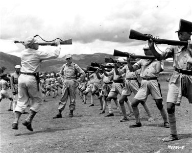 SC 195580-S - Sgt. P. O. Gibson, left, San Angelo, Texas, and Lt. J. A. Itaples, Fargo, N.D., instruct Chinese soldiers in the use of the bayonet. September, 1944.