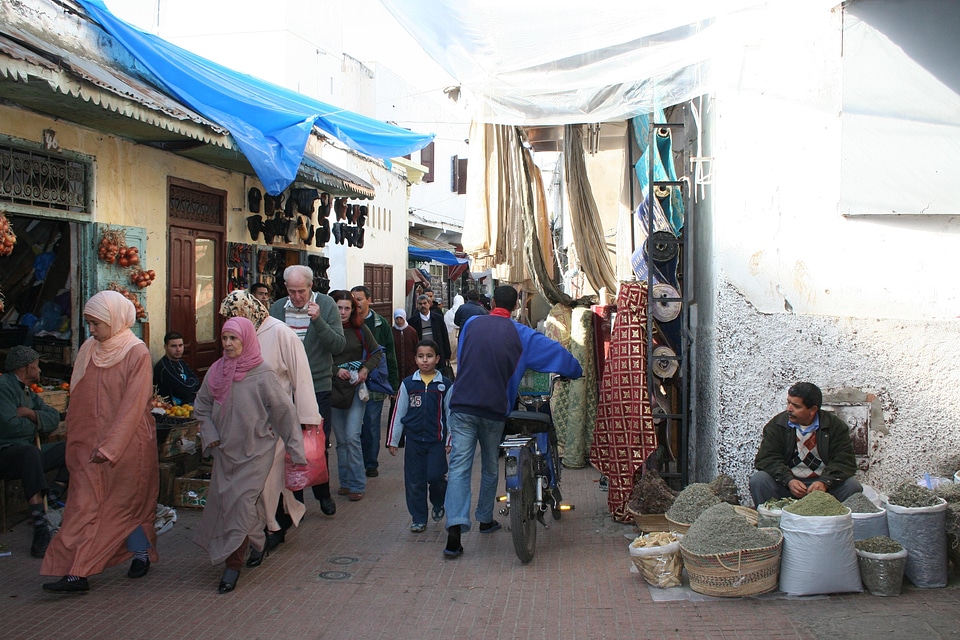Veiled women people market