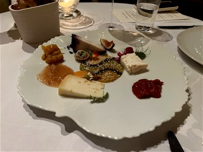 An Unusual Selection of Italian Cheeses and Condiments photo
