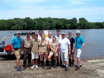 Service staff with the aqua kids after a day of learning about invasive carp and other aquatic invasive species