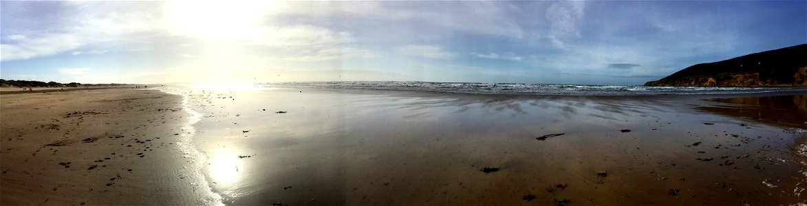 Kiteboarding, Windsurfer, Waves, Container Ship , Yacht , Saunton Sands Beach, Braunton, North Devon,  UK   1st Feb 2023  Apple Ipod Panoramic Photo
