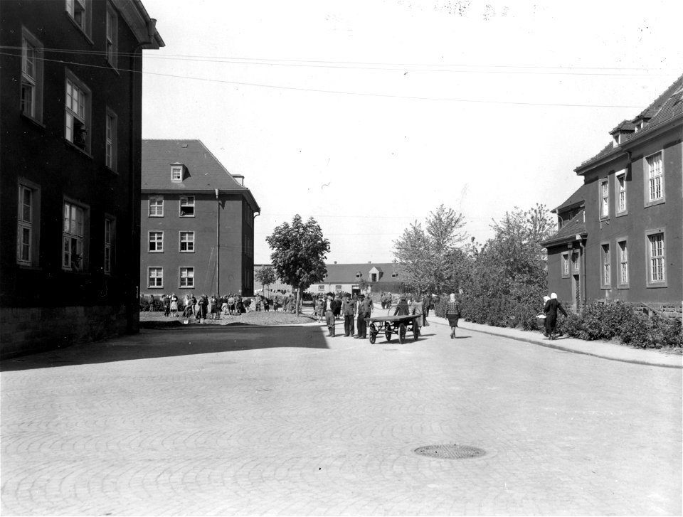 SC 335337 - Street activities within Displaced Persons Camp. Heidelberg, Germany. 26 April, 1945.