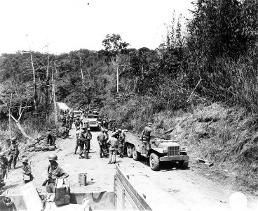 SC 270703 - With the 6th Inf. Div. in the Cagayan Valley, Luzon, P.I., about 9 miles north of Bagabag along Highway 4 on June 20, 1945.