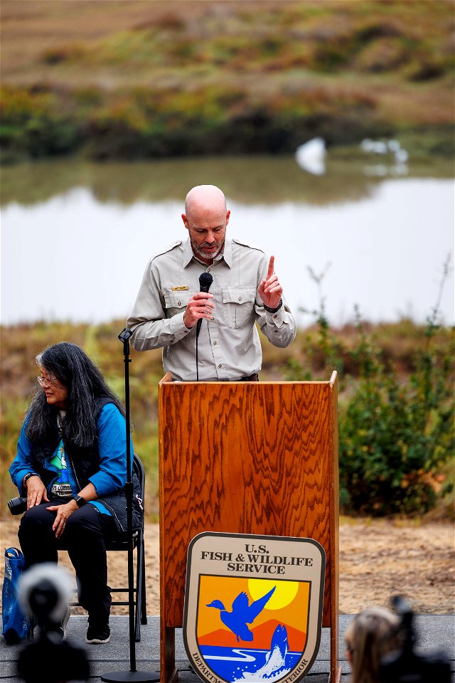 Complex manager speaks during opening ceremony photo