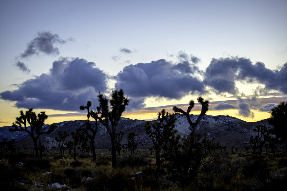 Clouds and snow over Lost Horse Valley at sunset