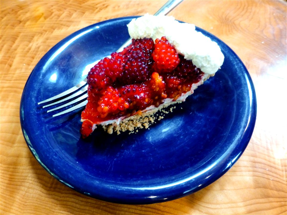 slice of slamon berry pie