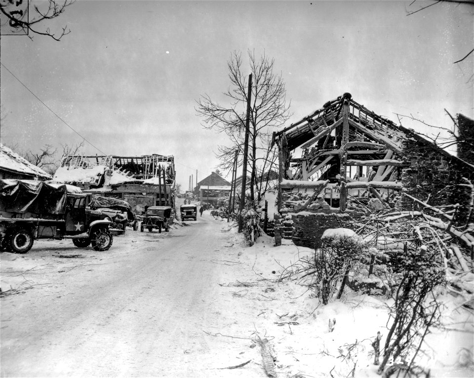 SC 329974 - Wrecked buildings on the street in Devantane, Belgium, after it was recaptured from the Germans by units of the 75th and 84th Infantry Divisions. 9 January, 1945.