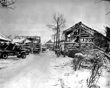 SC 329974 - Wrecked buildings on the street in Devantane, Belgium, after it was recaptured from the Germans by units of the 75th and 84th Infantry Divisions. 9 January, 1945. photo