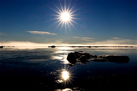 Midnight sun and sea ice photo