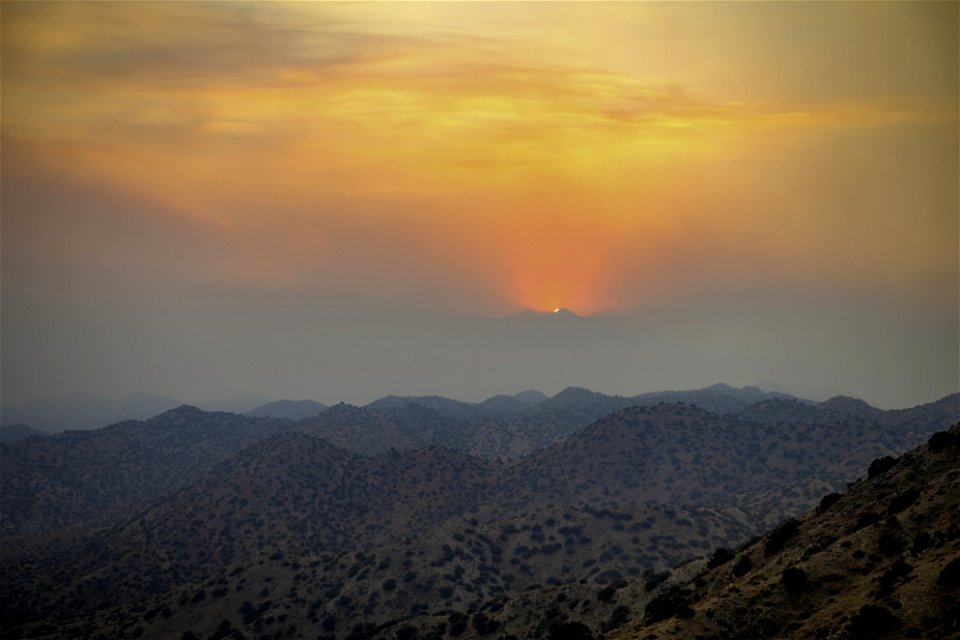 Smoke from Apple Fire at sunset at Eureka Peak