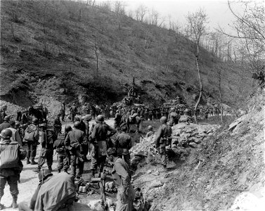 SC 270862 - 200 prisoners on their way to the rear after being captured by Co. "B", 87th Mtn. Inf., 10th Mtn. Div. April, 1945. photo