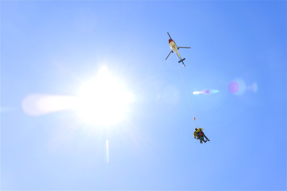 Yellowstone Helitack short-haul training: crew hauling patient to safety