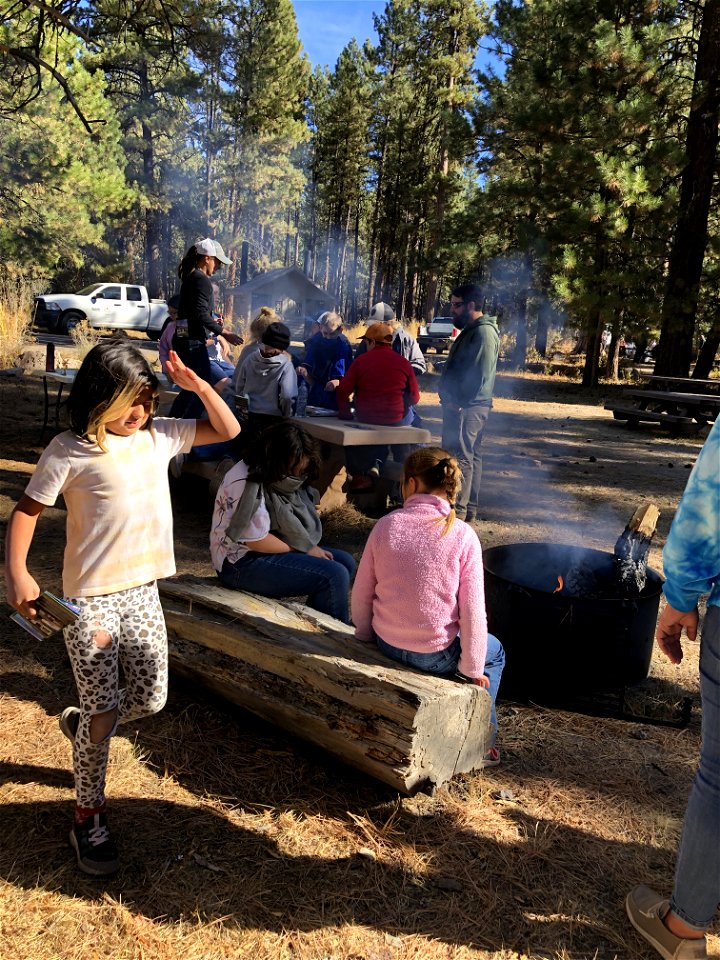 A group of kids learn about forest science at an Every Kid Outdoors Field Day
