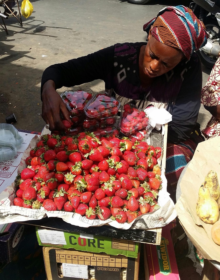 Market woman strawberry
