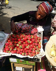 Market woman strawberry photo