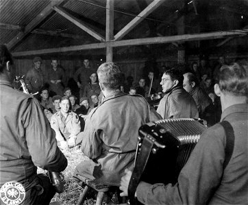 SC 195681 - Music is one of the chief forms of entertainment given to soldiers back from the front who have 48 hours of relaxation in this rest camp set up for members of the 102nd Cav. Grp.