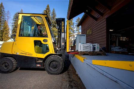 Lifting Park Supplies with Forklift photo
