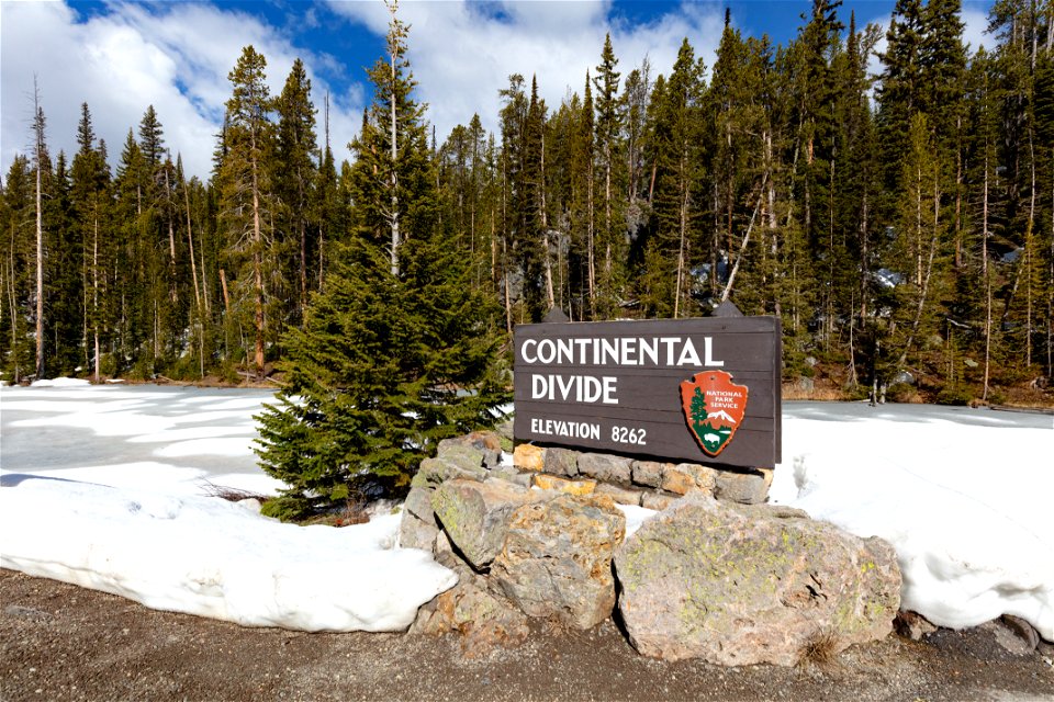 Continental Divide sign near Craig Pass in spring
