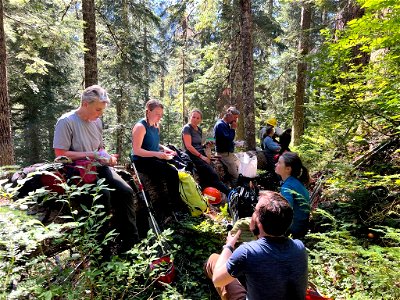 Taking a lunch break while volunteering with the Mountaineers on Church Creek Trail on the Olympic National Forest photo