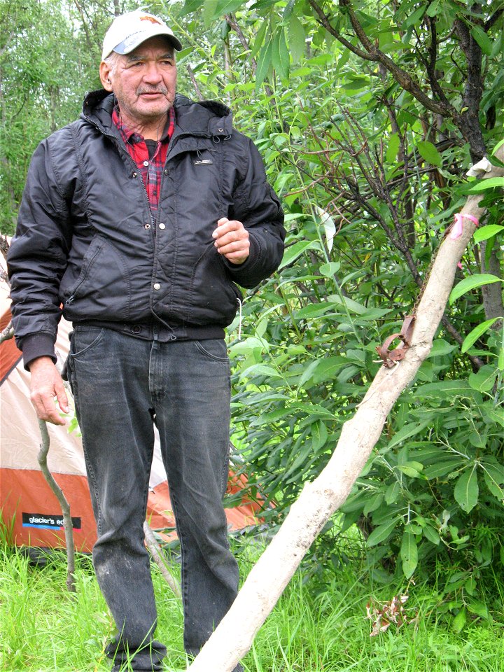 Allakaket resident Pollock Simon teaching traditional trapping techiniques
