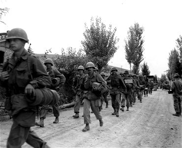 SC 348681 - Men of the 19th Inf. Regt., 24th Inf. Div., move up to the Naktong River front. 19 September, 1950. photo