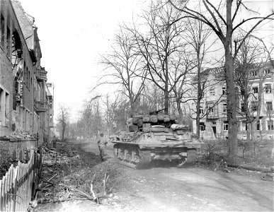 SC 334972 - Tank destroyer moves up to support an infantry attack on German assembly point on outskirts of Julich, Germany. 24 February, 1945. photo