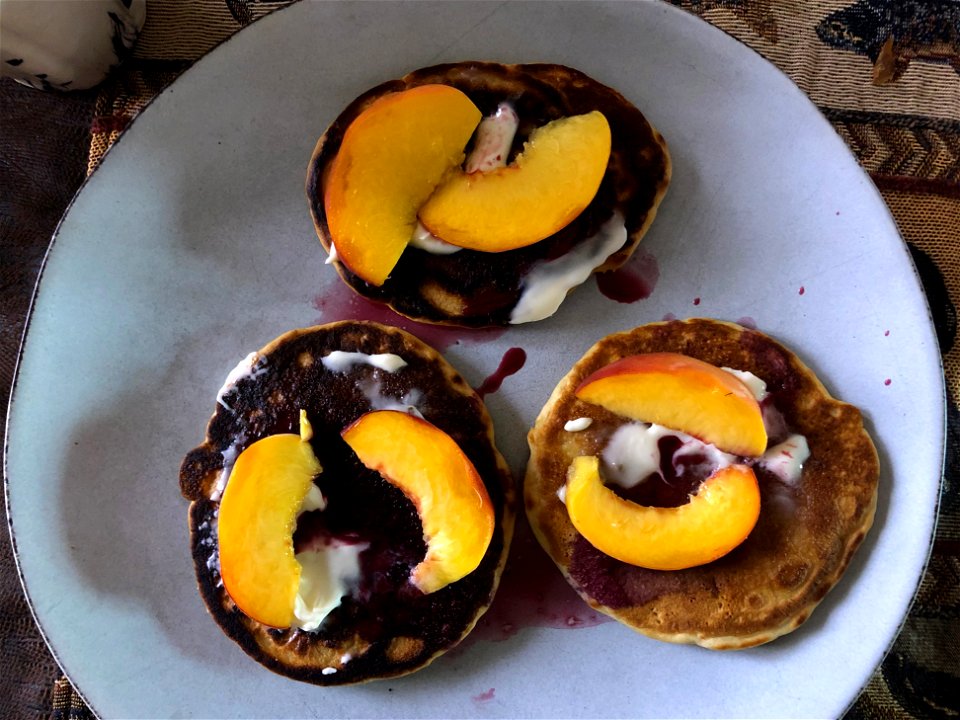 Chokecherry Syrup and Peaches on Pancakes