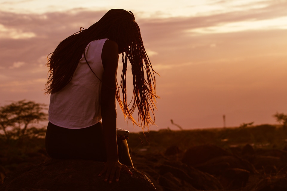 Girl at sunset photo