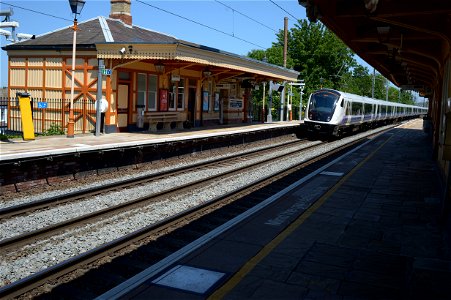 Class 345 train at Hanwell station bound for London Paddington photo