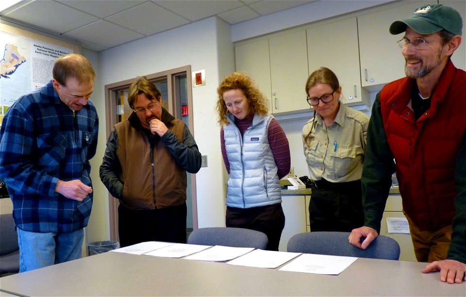 Judges viewing contest entries