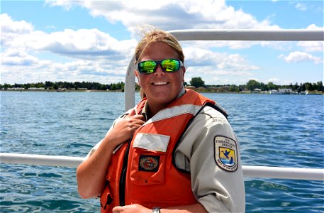 Biological Science Technician Tiffany Opalka-Myers helps out with a sea lamprey treatment on the St. Mary's River in upper Michigan. photo