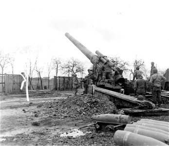 SC 364304 - Monster 240mm gun throws heavyweight projectile, backing up 35th Division drive into Germany. photo
