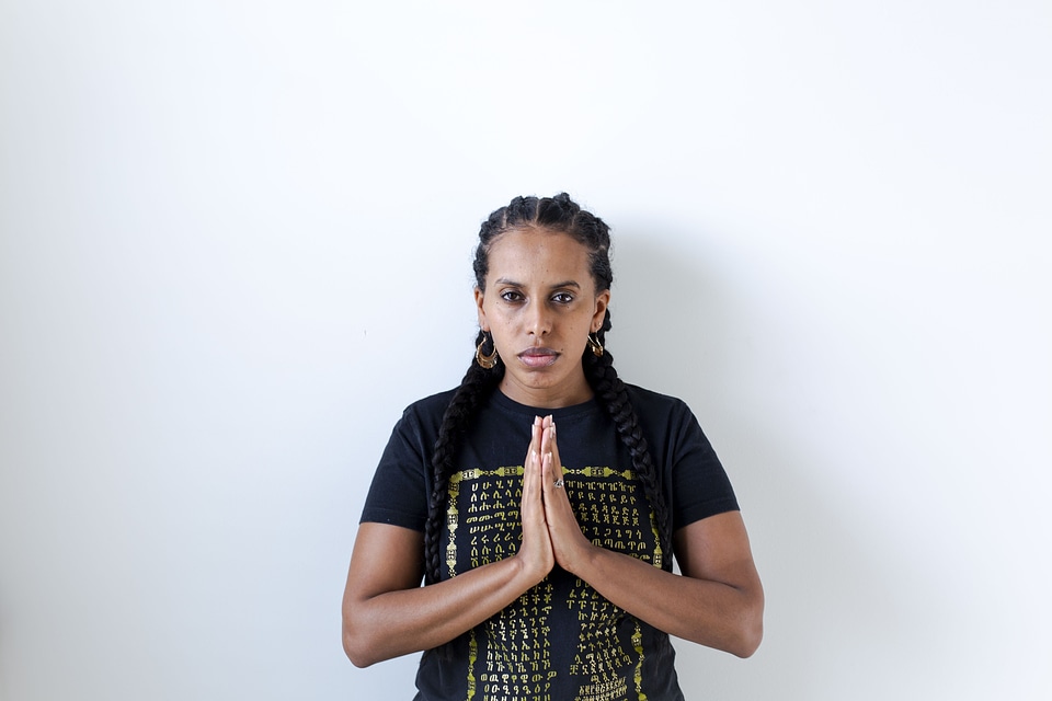 Praying brown latina